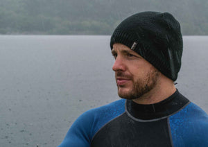 waterproof hat example with black beanie on man
